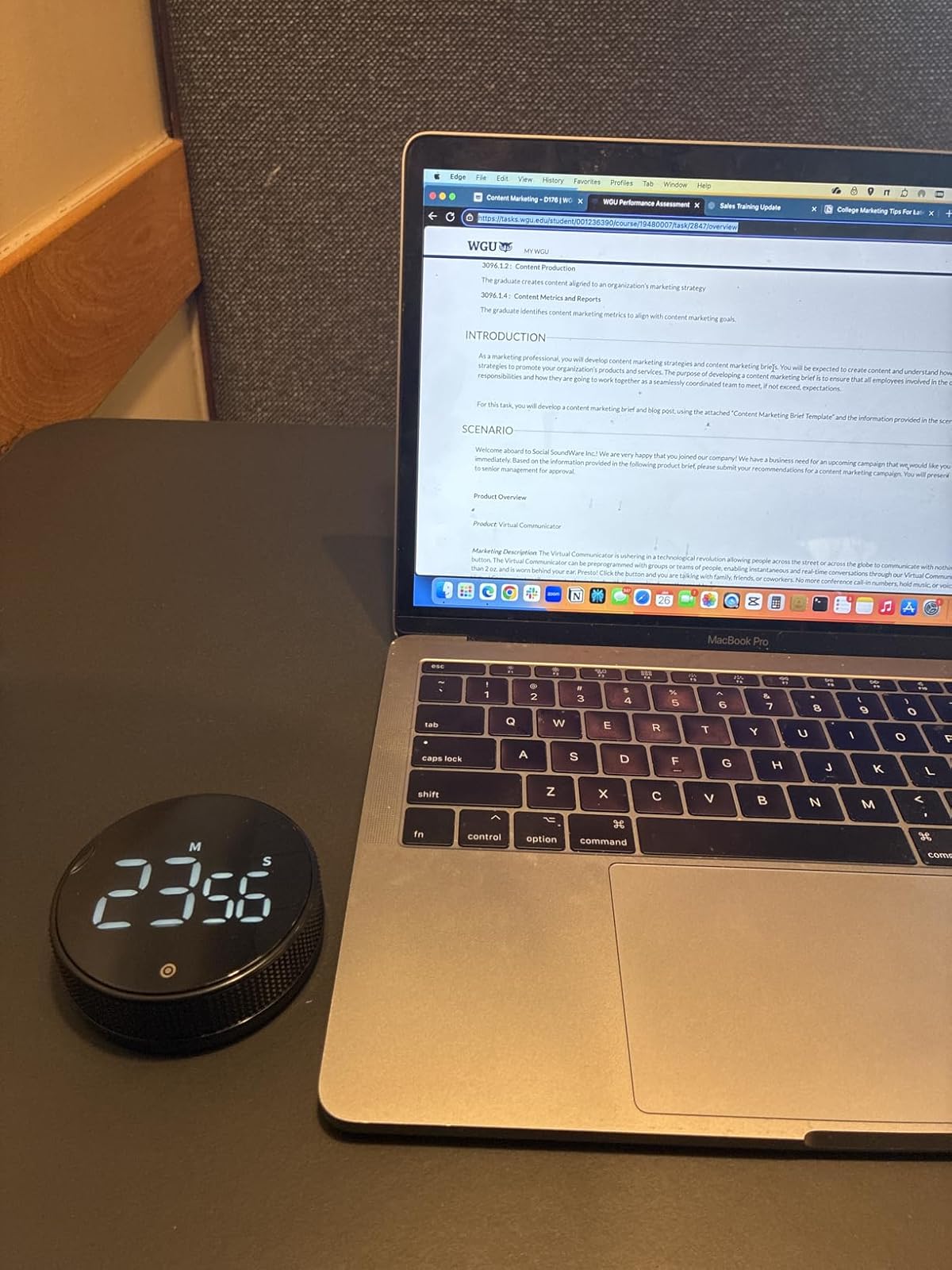 Volux timer next to MacBook